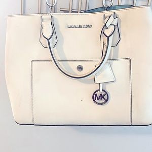 Michael Kors white purse with turquoise inside!